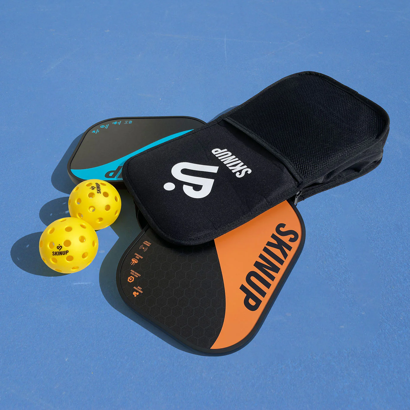 Kit pickleball 2 raquettes Yin Yang Orange et Bleu, 2 balles et 1 housse - SKINUP Sport – Image 2
